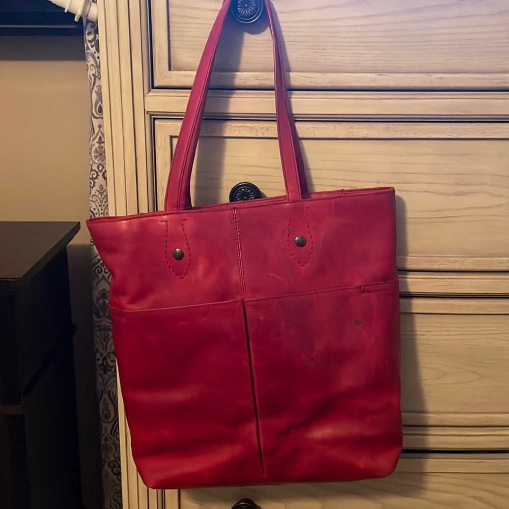 Gently used Frye bag. I only used it a few times then put it back in its bag.
